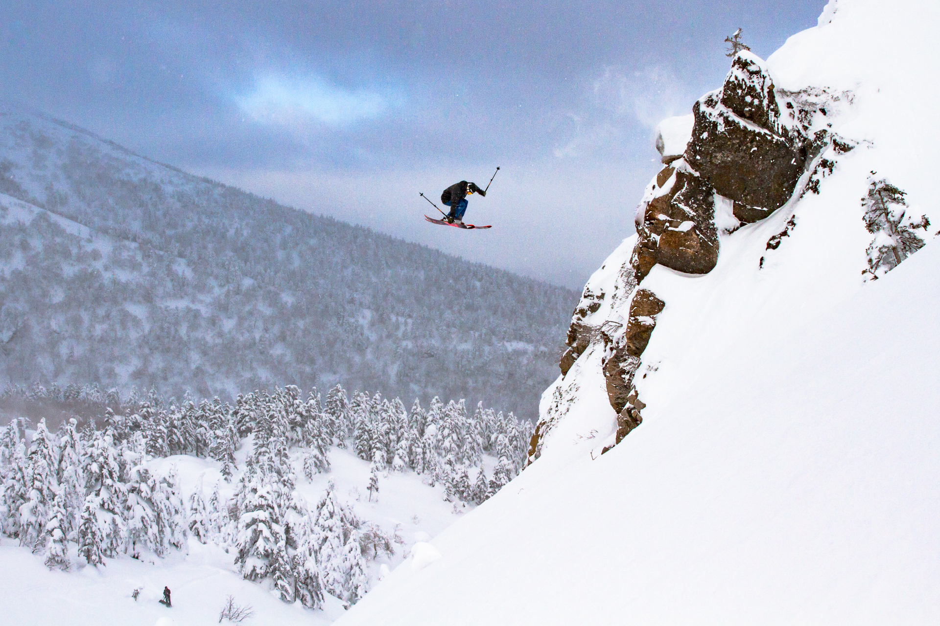 Kevin Brower 360s a cliff drop in Tokachidake, Japan.
