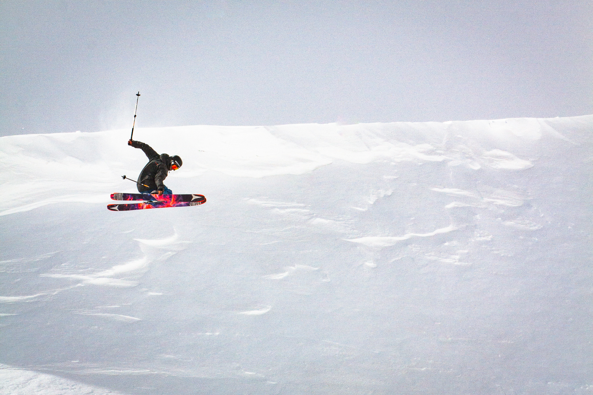 Kevin Brower with a classic 180 off a cornice near Niseko, Japan.
