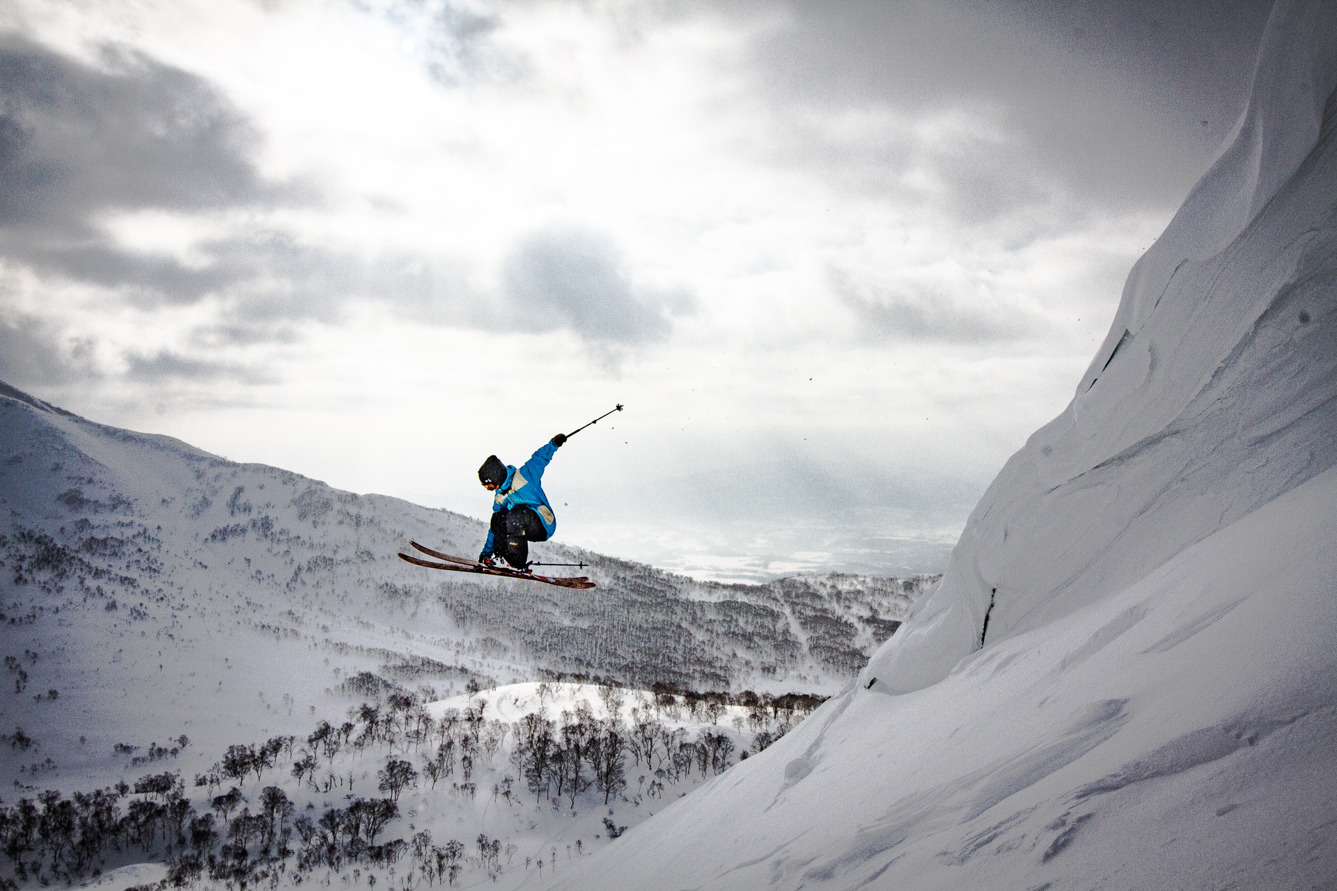 Mitchell Brower spins a switch 360 off a cornice in the Niseko backcountry.