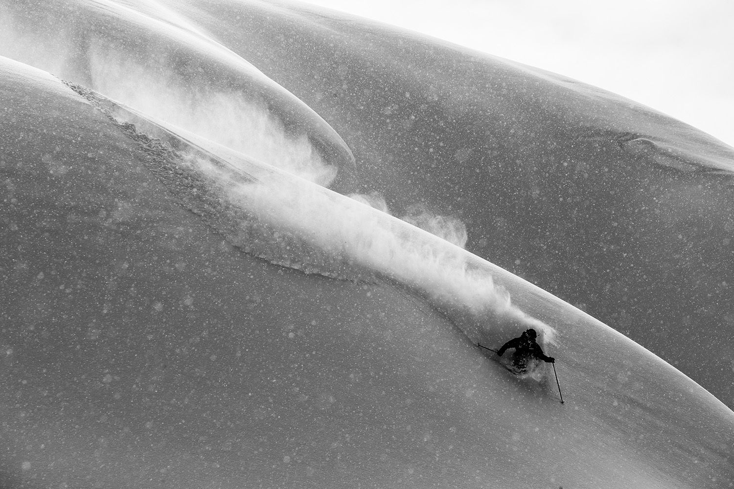 Sage Cattabriga-Alosa skis deep powder in Alaska's Neacola Mountains.