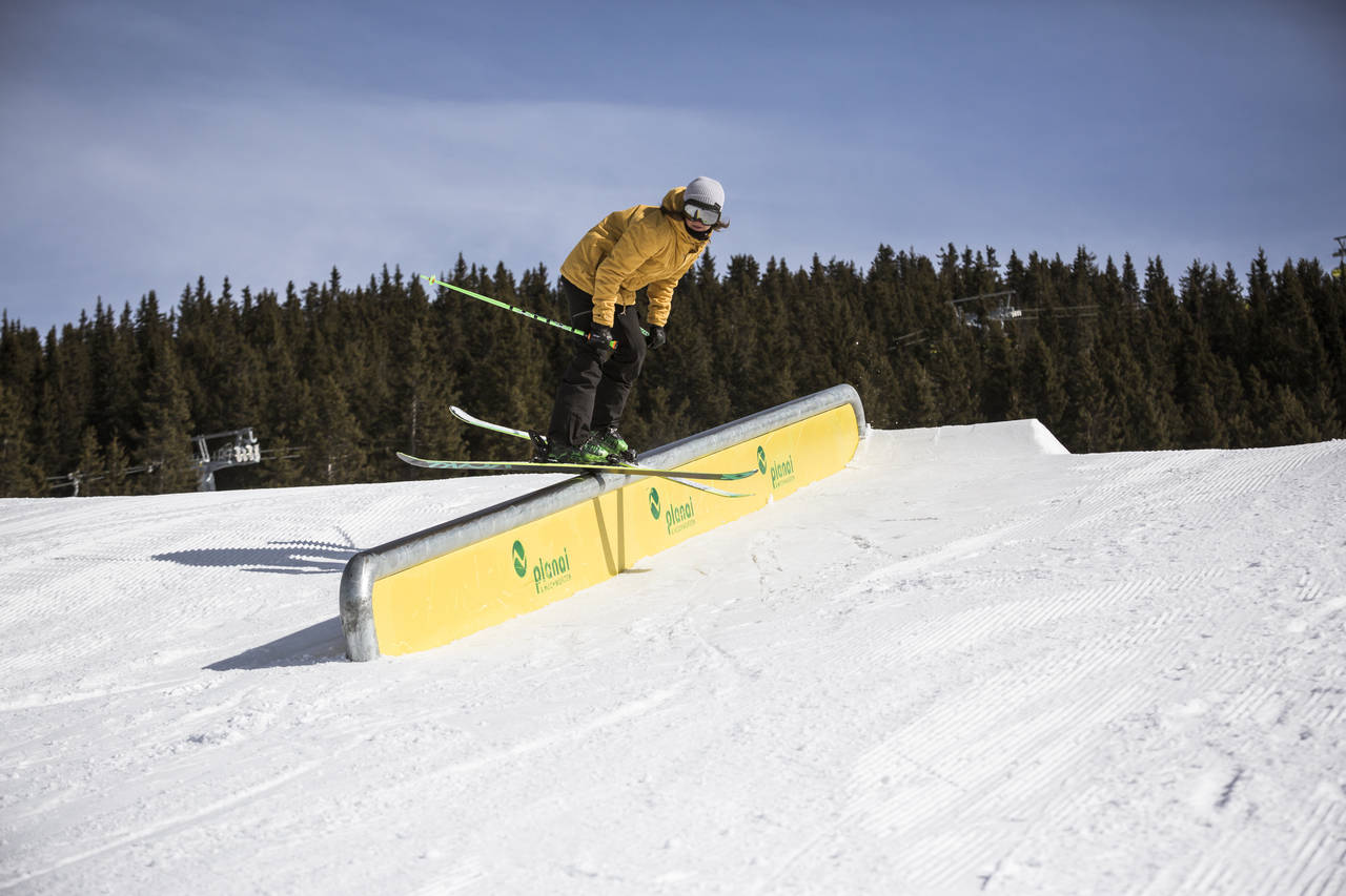 An unknown shredder on the Superpark Planai downrail captured by Roland Haschka