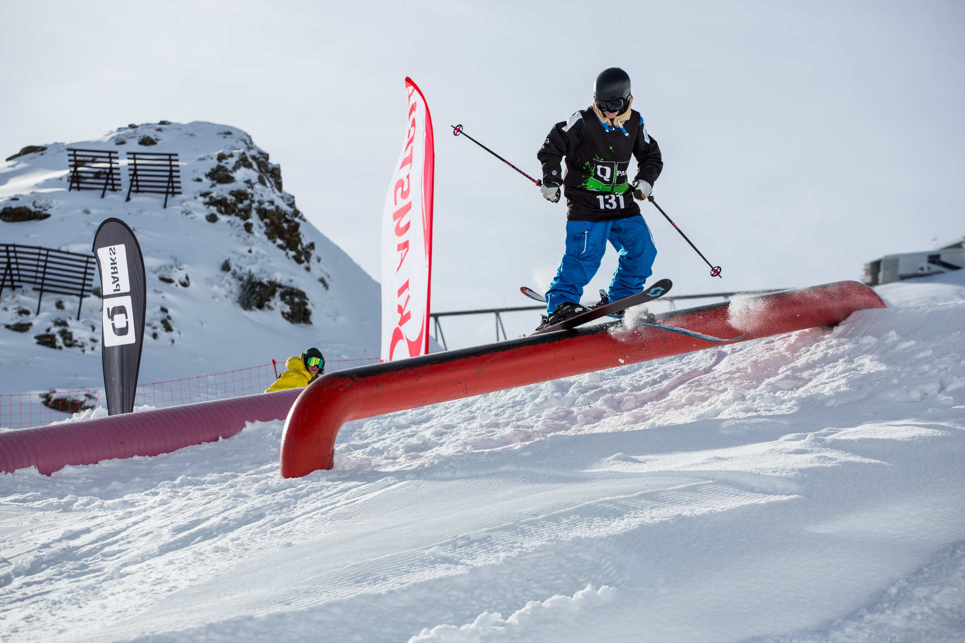 David Wolf sliding one of the various rail features at Golden Roofpark Axamer Lizum