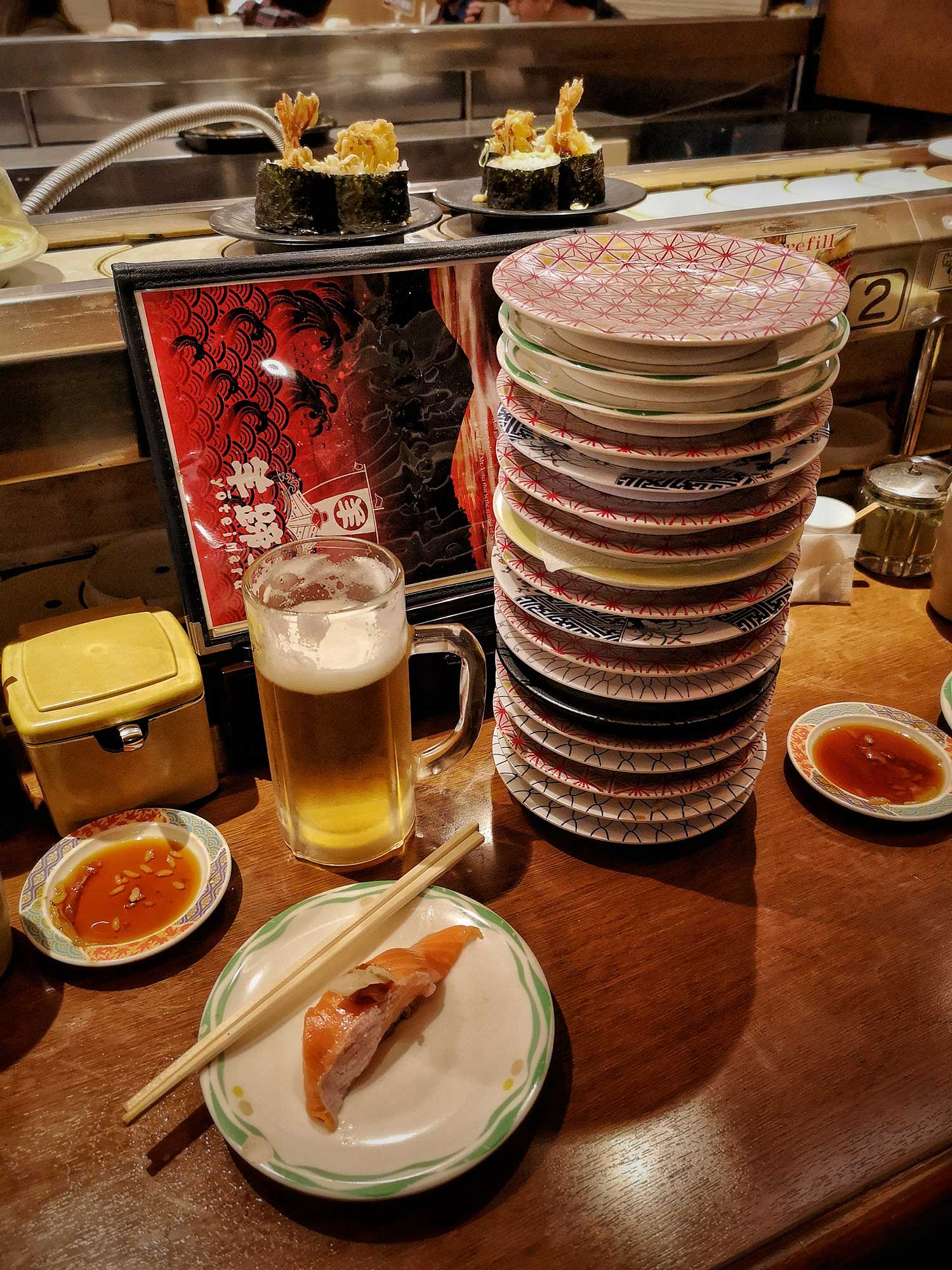 Eating sushi at a restaurant in Kutchan, Japan.