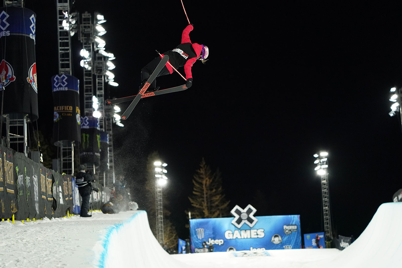 Eileen Gu grabs blunt during the 2021 Winter X Games Women's Ski Superpipe contest.