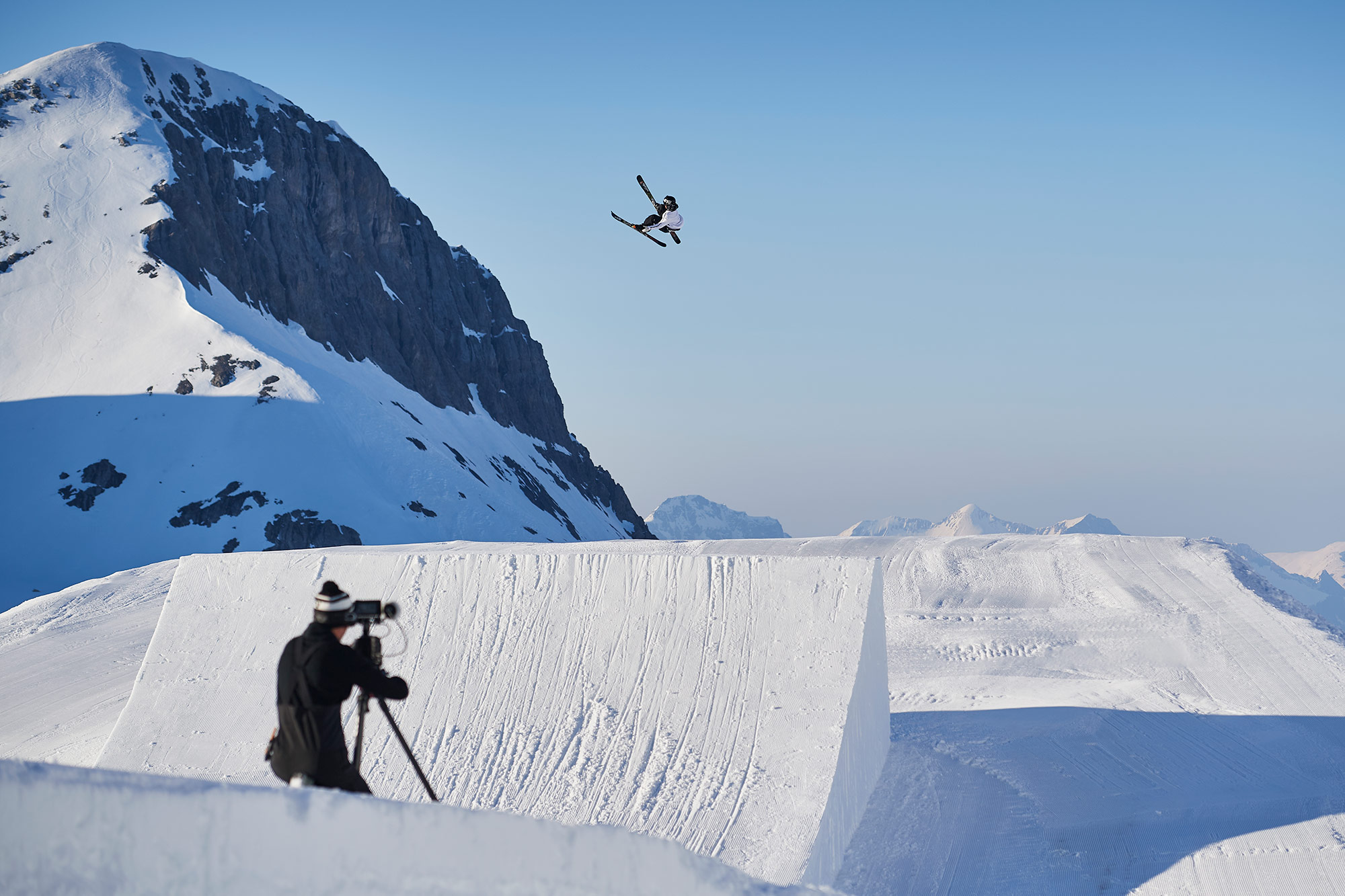 Tim Sivignon hits a jump in Crans-Montana, Switzerland for the Faction Skis movie ROOTS.