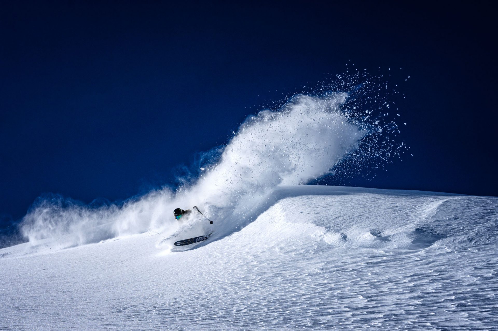Sammy Carlson blasting a pow turn while filming for North of Now.