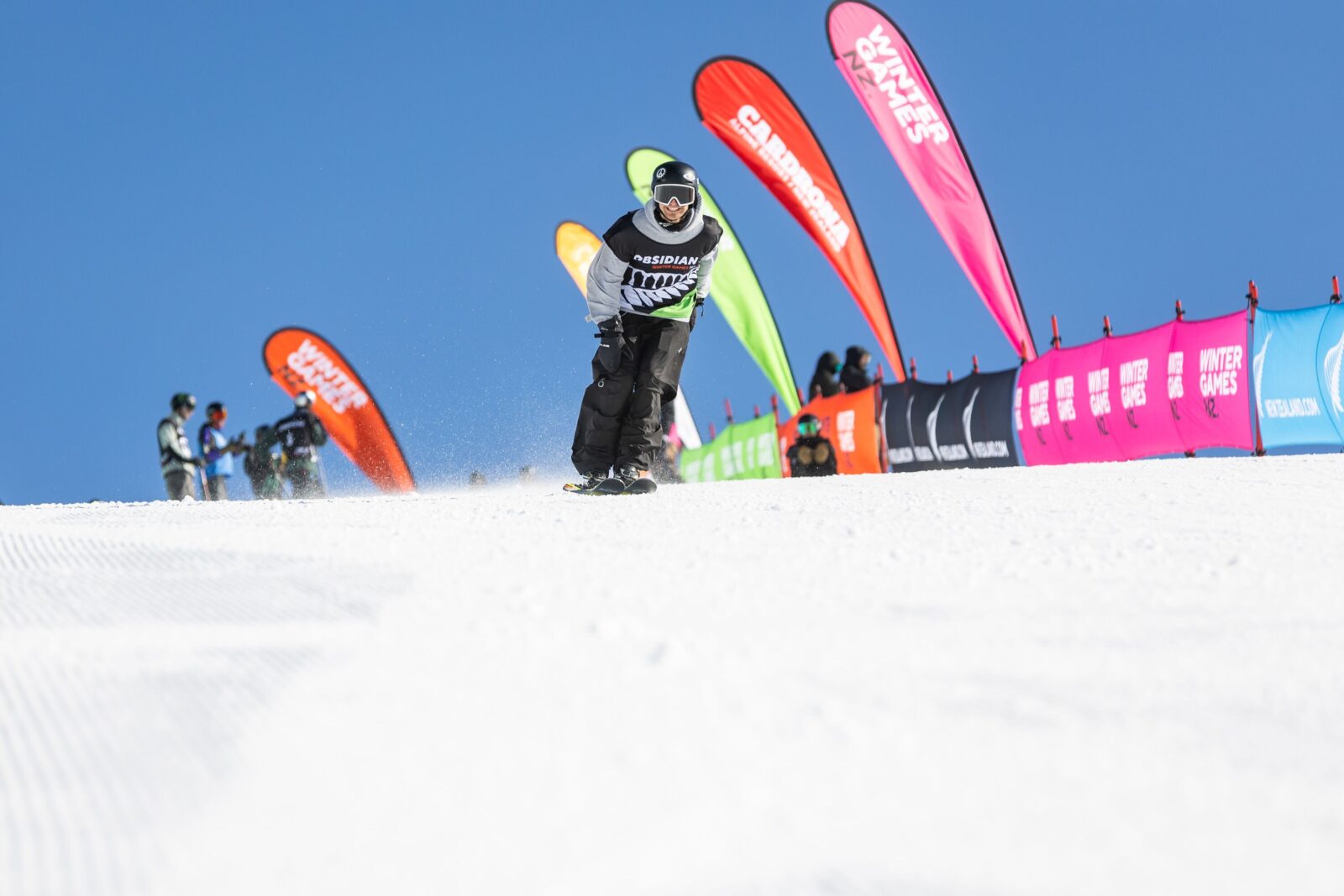 Finn Bilous dropping in at Cardrona Alpine Resort at the 2023 Winter Games NZ.